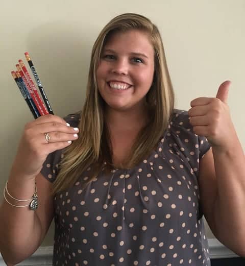 Local volunteer helping collect school supply donations.