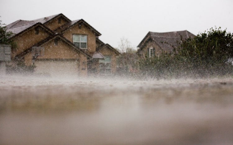 Widespread flooding in a residential neighborhood.