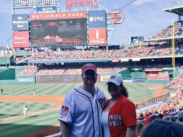 A local police officer at a baseball game.